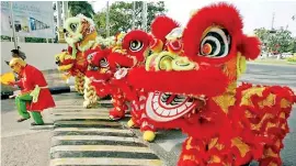  ??  ?? CHINESE NEW YEAR OF THE DOG: Will it be a ruff year or will it woof economic boom for Lanka?