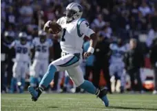  ?? CHARLES KRUPA/THE ASSOCIATED PRESS ?? Cam Newton is running with less reckless abandon this season in an effort to avoid the big hits he has taken in the past.