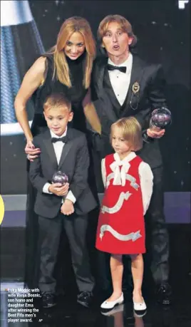  ?? AP ?? ■ Luka Modric with wife Vanja Bosnic, son Ivano and daughter Ema after winning the Best Fifa men’s player award.