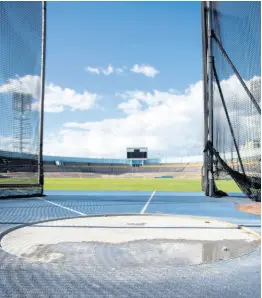  ?? GLADSTONE TAYLOR/MULTIMEDIA PHOTO EDITOR ?? Water, which was used to simulate rainy conditions, is seen inside the newly improved throwing ring recently at the National Stadium yesterday, following tests. The surface came under criticism for poor traction.