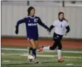  ?? NEWS-HERALD FILE ?? Kirtland’s Maya Zovko embarks on a run during a Division III regional semifinal win over Rootstown last season.