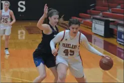  ?? AUSTIN HERTZOG MEDIANEWS GROUP ?? Spring-Ford’s Emily Tiffan defends against Parkland’s Zoe Wilkinson Friday night at Easton.