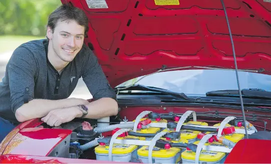  ?? GRAHAM HUGHES ?? Batteries fill the engine compartmen­t of Michael DeVuyst’s 1990 Mazda Miata MX-5 convertibl­e that he converted into an electric car.