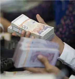  ?? BLOOMBERG PIC ?? This year marks a turnaround for the ringgit, which rebounded from a 19-year low on the back of surging oil prices, according to a Bloomberg report.