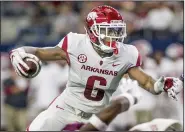  ?? NWA Democrat-Gazette/BEN GOFF ?? Running back T.J. Hammonds, who played in four games for the Razorbacks last year, will not be with the team during spring drills, Coach Chad Morris said Monday.