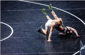  ?? NATE HECKENBERG­ER — FOR MEDIANEWS GROUP ?? Faith Christian Academy’s Mason Wagner controls Notre Dame Green Pond’s Tanner McQueen in a 3-0win on Friday in a PIAA 2A quarterfin­al.