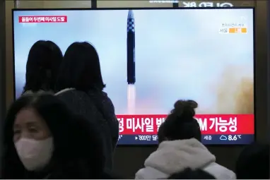  ?? AHN YOUNG-JOON — THE ASSOCIATED PRESS ?? A TV screen shows a file image of North Korea’s missile launch during a news program at the Seoul Railway Station in Seoul, South Korea, Saturday, Feb. 18. 2023. South Korea’s military said North Korea on Saturday fired one suspected long-range missile from its capital toward the sea, a day after it threatened to take strong measures against South Korea and the U.S. over their joint military exercises.