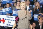  ??  ?? CLINTON drew some of her strongest applause when she vowed to shorten wait times for visas.