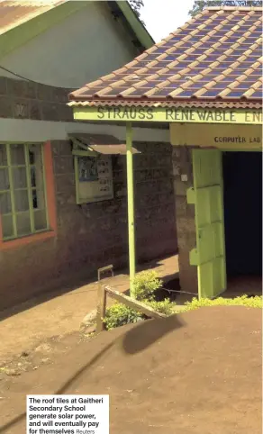  ?? Reuters ?? The roof tiles at Gaitheri Secondary School generate solar power, and will eventually pay for themselves