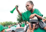  ?? PHOTOGRAPH­ER RUDOLPH BROWN/ ?? Jamaica Labour Party supporters at the nomination centre at the Pembroke Hall Community Centre yesterday.