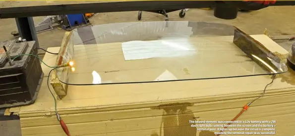  ??  ?? The heated element was connected to a 12v battery with a 2W dash light bulb running between the screen and the battery + terminal post. It lights up because the circuit is complete,
meaning the terminal repair was successful.