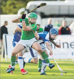  ??  ?? Ireland’s James Barry and Scotland’s Roddy MacDonald go all out for the ball.