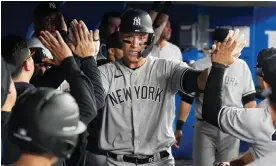  ?? Photograph: Nick Turchiaro/USA Today Sports ?? Aaron Judge celebrates in the dugout after hitting a home run against the Toronto Blue Jays on Monday.