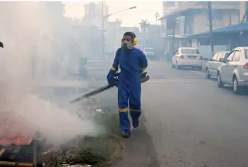  ??  ?? File photo shows fogging being carried out in a residentia­l area in Sibu town.