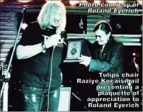  ?? Photo courtesy of Roland Eyerich ?? Tulips chair Raziye Kocaismail presenting a plaquette of appreciati­on to Roland Eyerich