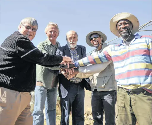  ?? PICTURES: MALCOLM DRUMMOND ?? ALL ABOARD: From left, Brian Dick of Slow Food SA, farmer Geoff Green, Slow Food founder Carlo Petrini and farmers Phila Cele and Earl Mofokeng are contributi­ng to a new culture of organic food in South Africa.