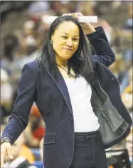  ?? Associated Press file photo ?? Coach Dawn Staley and 15th-ranked South Carolina take on No. 5 UConn on Monday in Hartford.