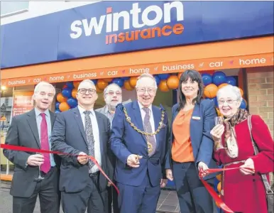  ?? Picture: www.matthewwal­kerphotogr­aphy.com ?? Staff and customers of the Maidstone branch were joined by Richard Beaven, distributi­on director of Swinton Insurance, and Mayor of Maidstone Cllr Derek Butler at the relaunch of Swinton Insurance’s Maidstone branch last December