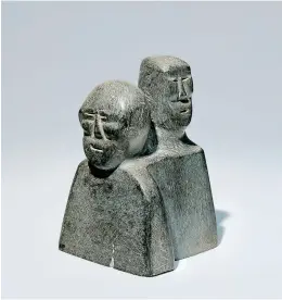  ??  ?? John Tiktak (1916–1981 Kangiqlini­q) — LEFT Mother and Child c. 1963-64 Stone 13 × 8.9 × 8.6 cm TWOMEY COLLECTION, WINNIPEG ART GALLERY PHOTO ERNEST MAYER