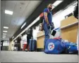  ?? OCTAVIO JONES - THE ASSOCIATED PRESS ?? Toronto Blue Jays minor league baseball player Steward Berroa, center, prepares to fly home along with his teammates from the Dominican Republic at the Tampa Internatio­nal Airport in Tampa, Florida on Sunday, March 15, 2020.