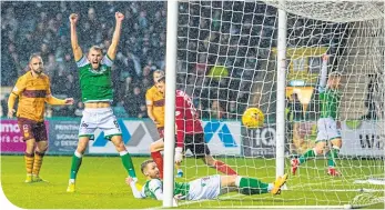  ??  ?? Hibs’ winger Daryl Hogan taps the ball home to seal the points for Jack Ross