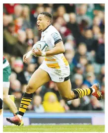  ??  ?? Scorcher: Marcus Watson breaks clear to score his sensationa­l second try for Wasps