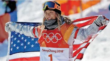  ?? [AP PHOTO] ?? Chloe Kim, of the United States, celebrates winning gold after the women’s halfpipe finals at Phoenix Snow Park at the 2018 Winter Olympics in Pyeongchan­g, South Korea. Before Kim won gold in the snowboardi­ng halfpipe event, her infectious personalit­y...