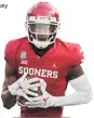  ??  ?? OU running back Mikey Henderson