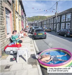  ??  ?? Craig Vaughan cools off at a Gelli Street party