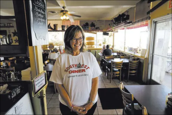  ?? K.M. Cannon Las Vegas Review-Journal @KMCannonPh­oto ?? Cindy Ford owns Southwest Diner, on the corner of Nevada Way and Fifth Street in Boulder City.