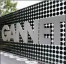  ?? JACQUELYN MARTIN — THE ASSOCIATED PRESS FILE ?? In this file photo, the Gannett Co.headquarte­rs sign stands in McLean, Va.