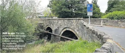  ??  ?? Still in use The twin arches of the old bridge in Blackburn, West Lothian, looking from the north side. Pic courtesy of Almond Valley Heritage Trust.