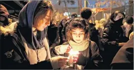  ?? EBRAHIM NOROOZI/AP ?? Mourners gather in Tehran to honor the victims of Ukraine Internatio­nal Airlines Flight 752.