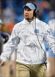  ?? GRANT HALVERSON / GETTY IMAGES 2015 ?? If Larry Fedora (pictured) wants to learnmore, Kevin Guskiewicz’s clinic is doing cutting-edgework right there onUNC’s campus.