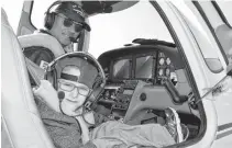  ?? SHARON MONTGOMERY • CAPE BRETON POST ?? Businessma­n and pilot Dimitri Neonakis prepares to take off with Brett Costigan, 7, of New Waterford at the J.A. Douglas Mccurdy Sydney Airport in this file photo. Through his charity Dream Wings Neonakis has flown children with disabiliti­es and with special needs since 2017.