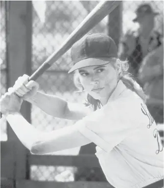  ??  ?? Geena Davis in a scene from A League of Their Own. The women’s baseball hit is celebratin­g its 25th anniversar­y with the April 18 release of a Blu-ray edition.