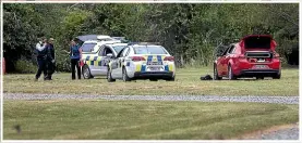  ?? ROBERT KITCHIN/STUFF WARWICK SMITH/STUFF ?? Right, a police cordon at Vinegar Hill after police shot an armed man at the campsite.