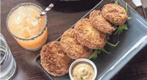  ?? PROVIDED BY ANGLEA GERKINS ?? Sarah’s fried green tomatoes and remoulade at CASK Southern Kitchen & Bar.
