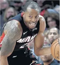  ?? STEVE DYKES/AP ?? Andre Iguodala now could find himself with the opportunit­y for extensive practice time with Heat.