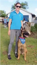  ?? ?? Beverly Jackman (Bevlin Dog Training) with one of the trained belgian malinois breed dogs.