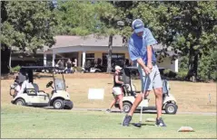  ?? Daniel Bell ?? Barry
Hulsey drives from the 10th hole at Fields Ferry Golf Club in 2019 during the Gordon County Chamber of Commerce’s annual tournament.