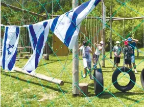  ?? (Courtesy) ?? CELEBRATIN­G ISRAEL day at the summer camp of the Greek Jewish community.