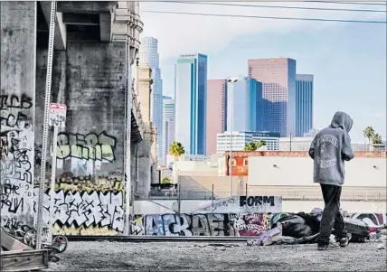  ?? Robert Gauthier Los Angeles Times ?? PEOPLE REST under the 4th Street Bridge. More than 57,000 people are homeless in Los Angeles County on any given night.