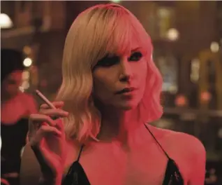  ??  ?? Charlize Theron stars in Atomic Blonde. Below: Brian Cox in Succession