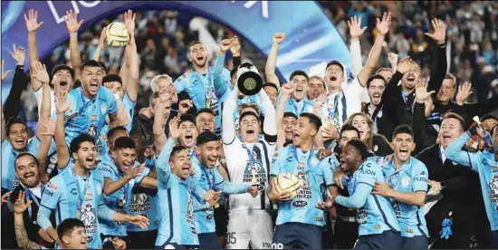  ?? ?? Pachuca players celebrate with the trophy after winning the Mexican soccer league title match against Toluca, in Pachuca, Mexico. Pachuca won 3-1. (AP)
Hosts overcome Irish at T20 WC