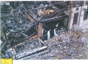  ??  ?? Court exhibits, from top: The destroyed building housed ( from left) Pizza Man, Cush Lounge, Grecian Delight and Black &amp; White Cafe. Feras Rahman outside his Black &amp; White Cafe the night of its soft opening in December 2008. The fire-ruined facades of Grecian Delight and Black &amp; White.