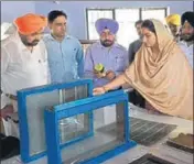  ?? HT PHOTO ?? Union minister Harsimrat Kaur Badal inspecting honey production at a centre in Kheri village in Sangrur on Monday.