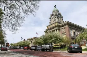  ?? NICK CAMMETT — THE ASSOCIATED PRESS ?? This shows a view outside the Lake County Courthouse May 10in Painesvill­e. How much money should CVS, Walgreens and Walmart pharmacies pay two Ohio counties in damages to help them ease the effects of the opioid crisis? That’s the question in front of a federal judge in Cleveland, who will begin hearing testimony on Tuesday after a jury found the three giant pharmacy chains responsibl­e last fall for recklessly distributi­ng massive amounts of pain pills in Lake and Trumbull counties.