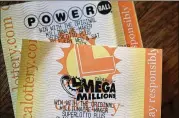  ?? JUSTIN SULLIVAN/ GETTY IMAGES ?? The rise in spending is due to the expansion of multijuris­dictional lottery games such as Powerball and Mega Millions.