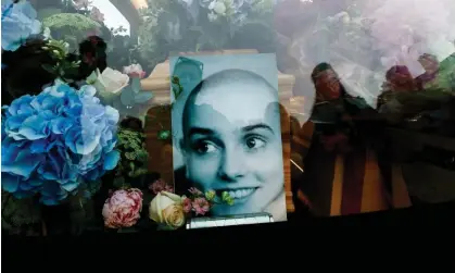  ?? ?? A picture of Sinéad O’Connor in the hearse for her funeral procession in August 2023. Photograph: Clodagh Kilcoyne/Reuters